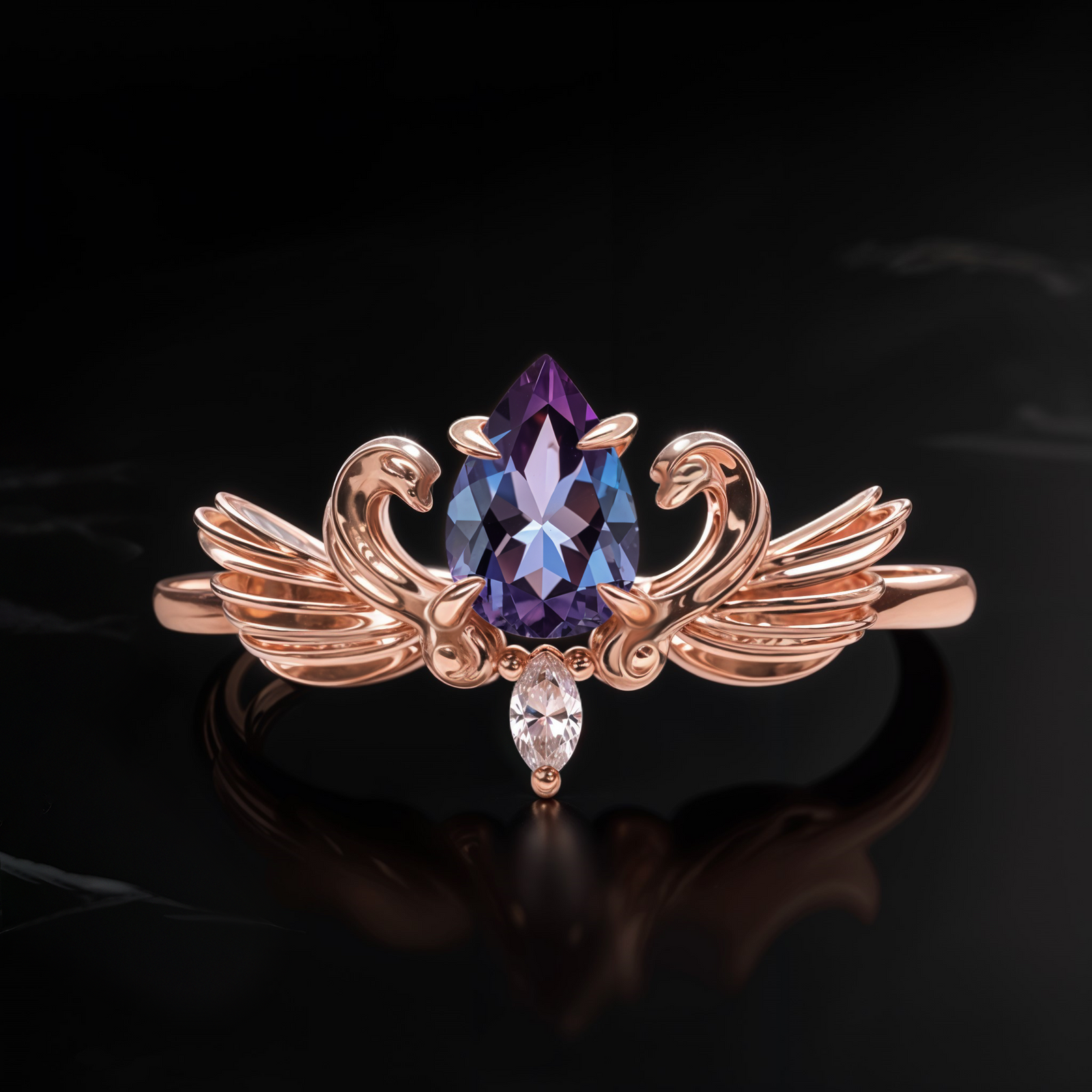 Fifth Avenue Phoenix Heart Alexandrite ring in rose gold with pear-cut Alexandrite gemstone and wing-inspired band design.