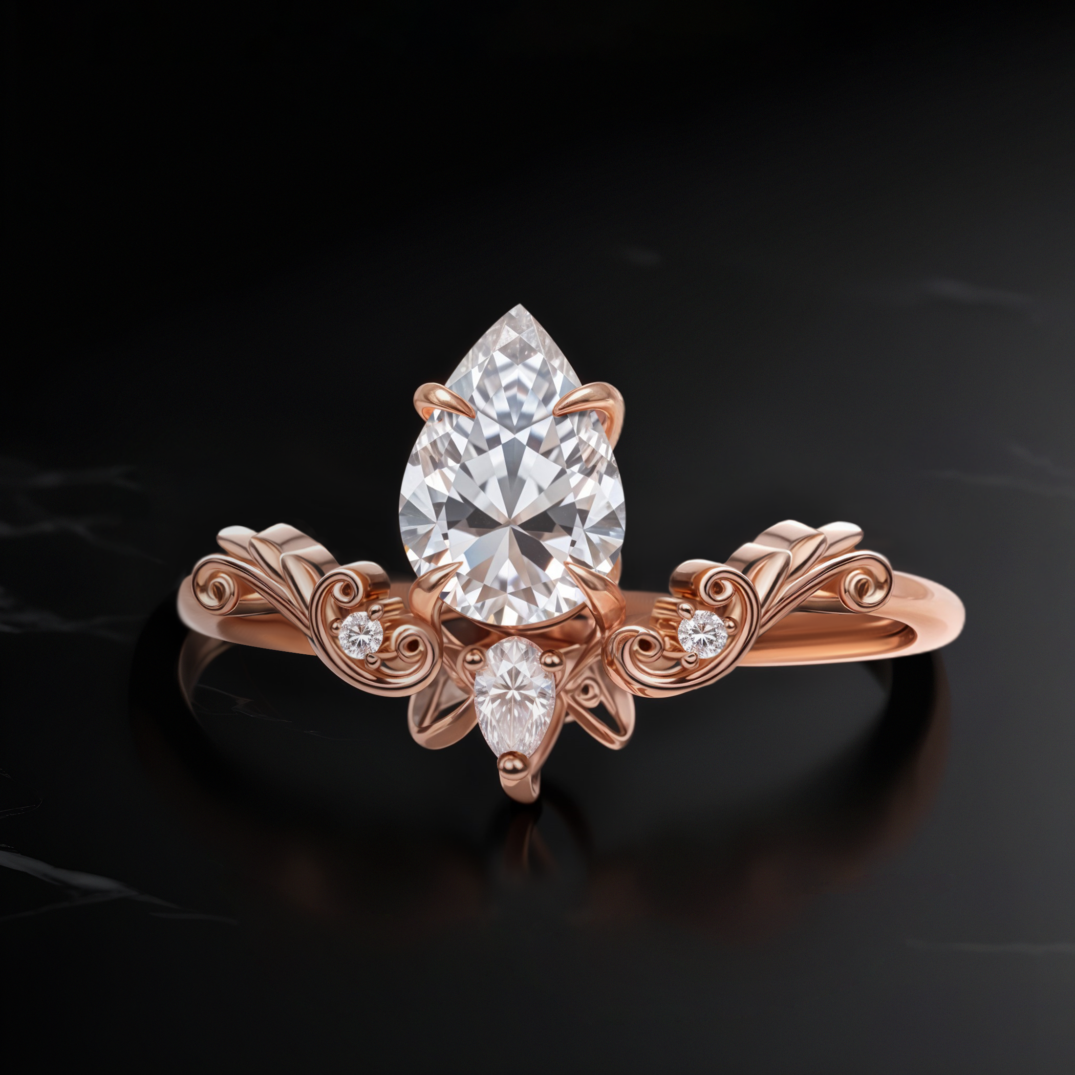 Close-up of Vintage Drop Moissanite ring in rose gold, featuring an 8 mm pear-cut Moissanite with intricate scrollwork band design.