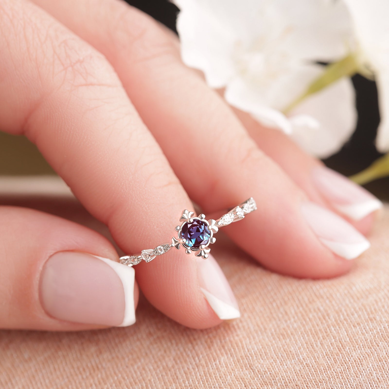 Close-up shot of the Alexandrite Engagement Sparkling Ring in silver gold, focusing on the intricate design and detailing of the ring