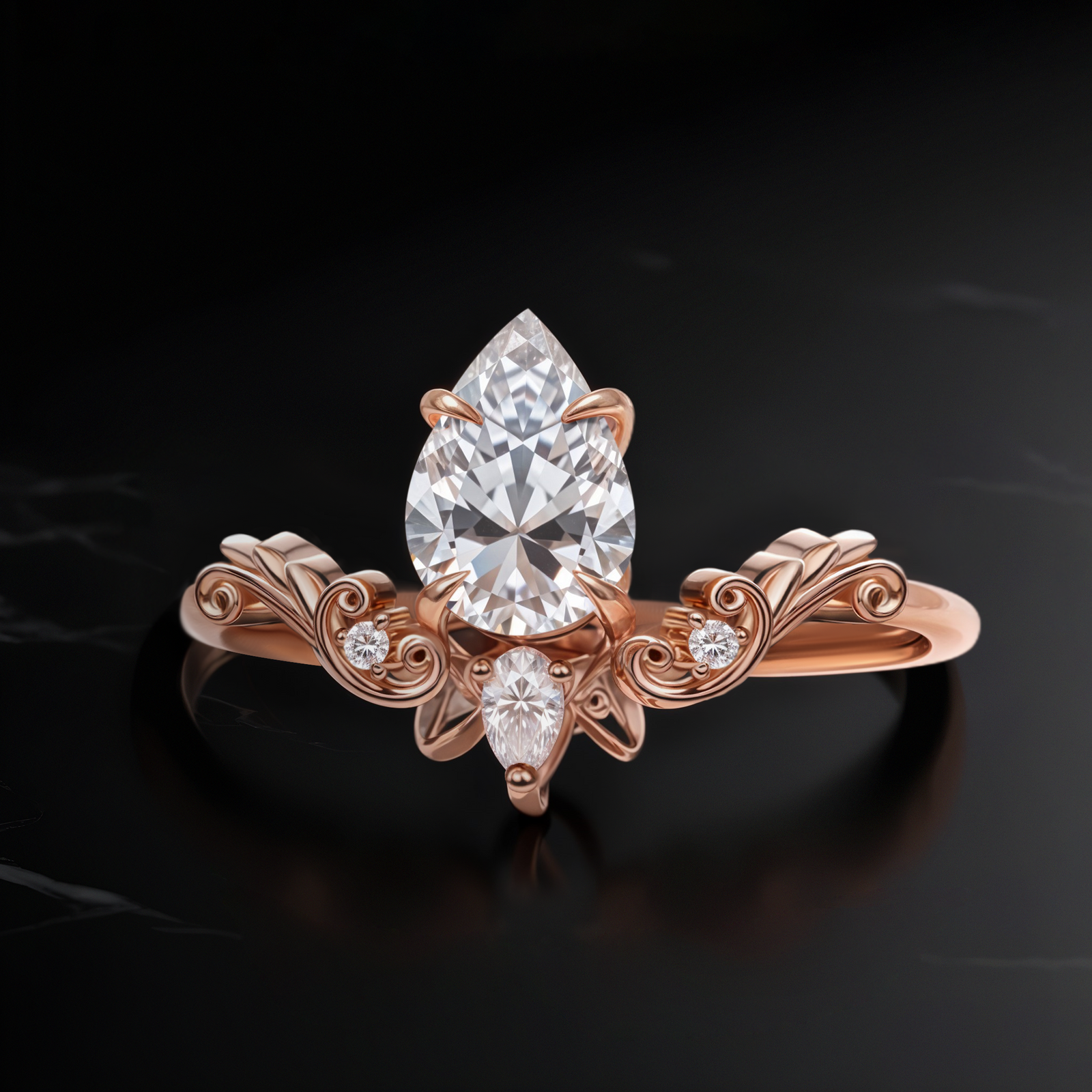 Close-up of Vintage Drop Moissanite ring in rose gold, featuring an 8 mm pear-cut Moissanite with intricate scrollwork band design.