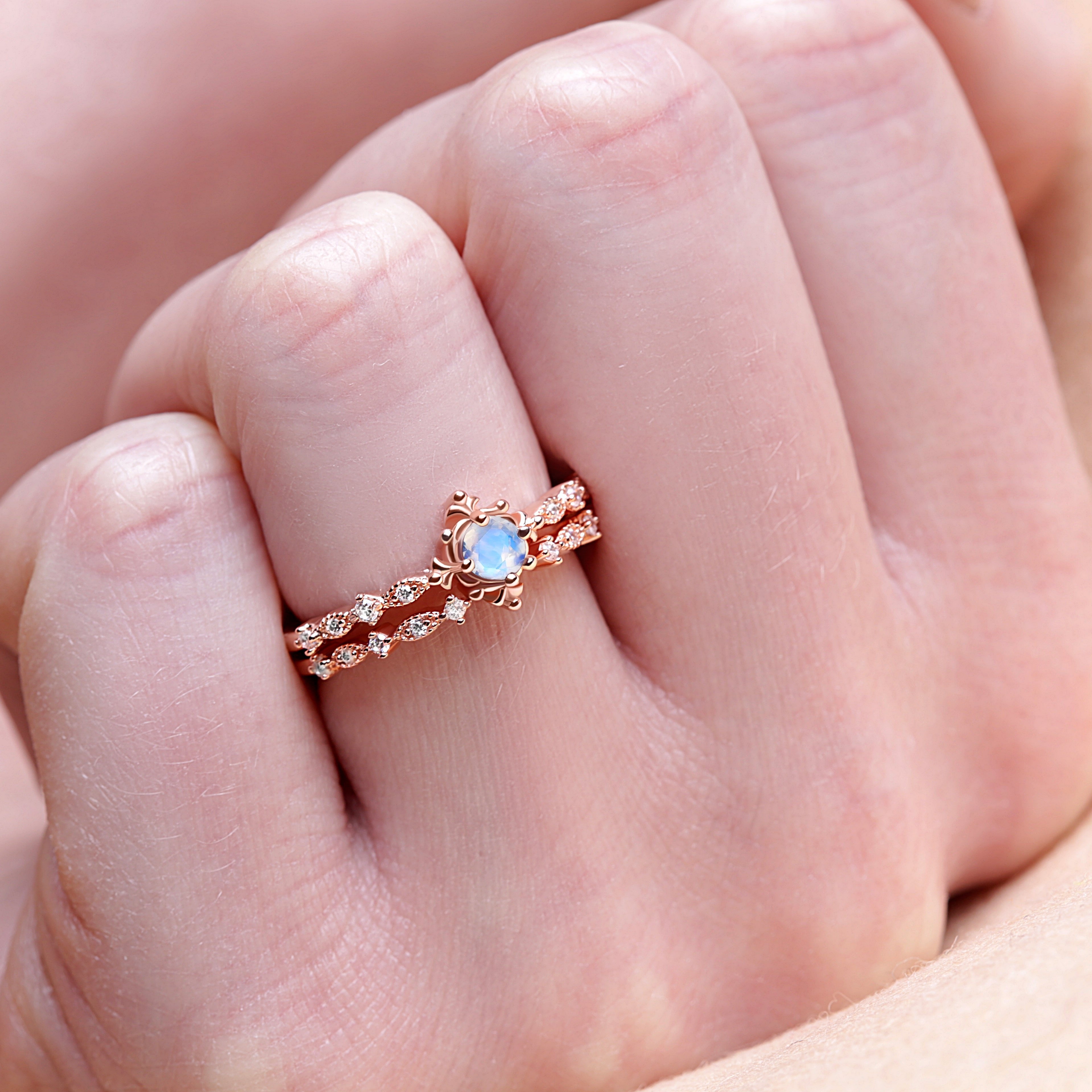 Silver moonstone ring worn by model