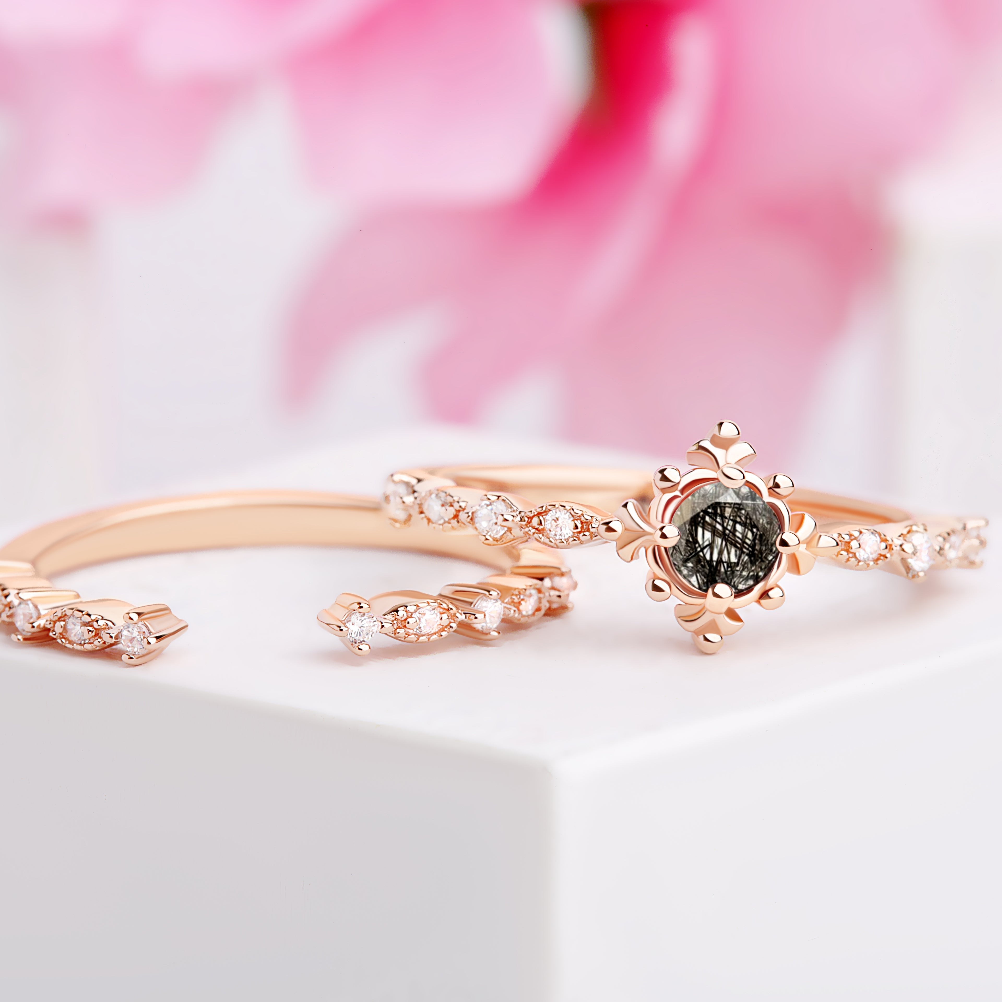 Black Rutilated Bridal Set in rose gold with 5mm oval Black Rutilated Quartz and White Zircon gemstones - Frontal view