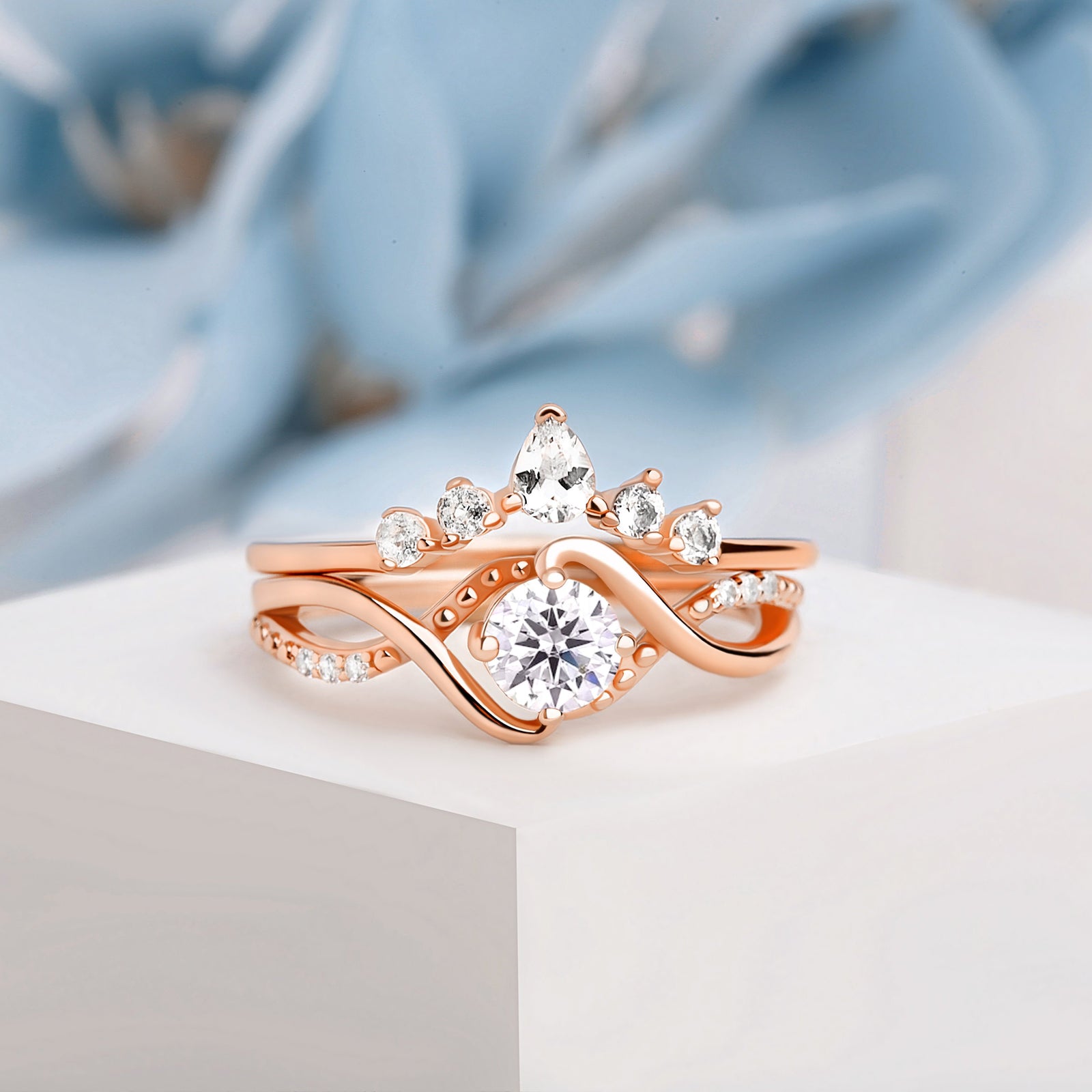 Close-up of the Moissanite Engagement Ring Set, featuring a 5mm oval-cut Moissanite and White Zircon accents in a 24K gold-plated band