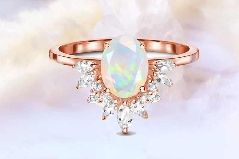 Close-up of the Opal Radiance Engagement Ring in rose gold, featuring a 7 mm oval Opal Stone with 24K gold plating.