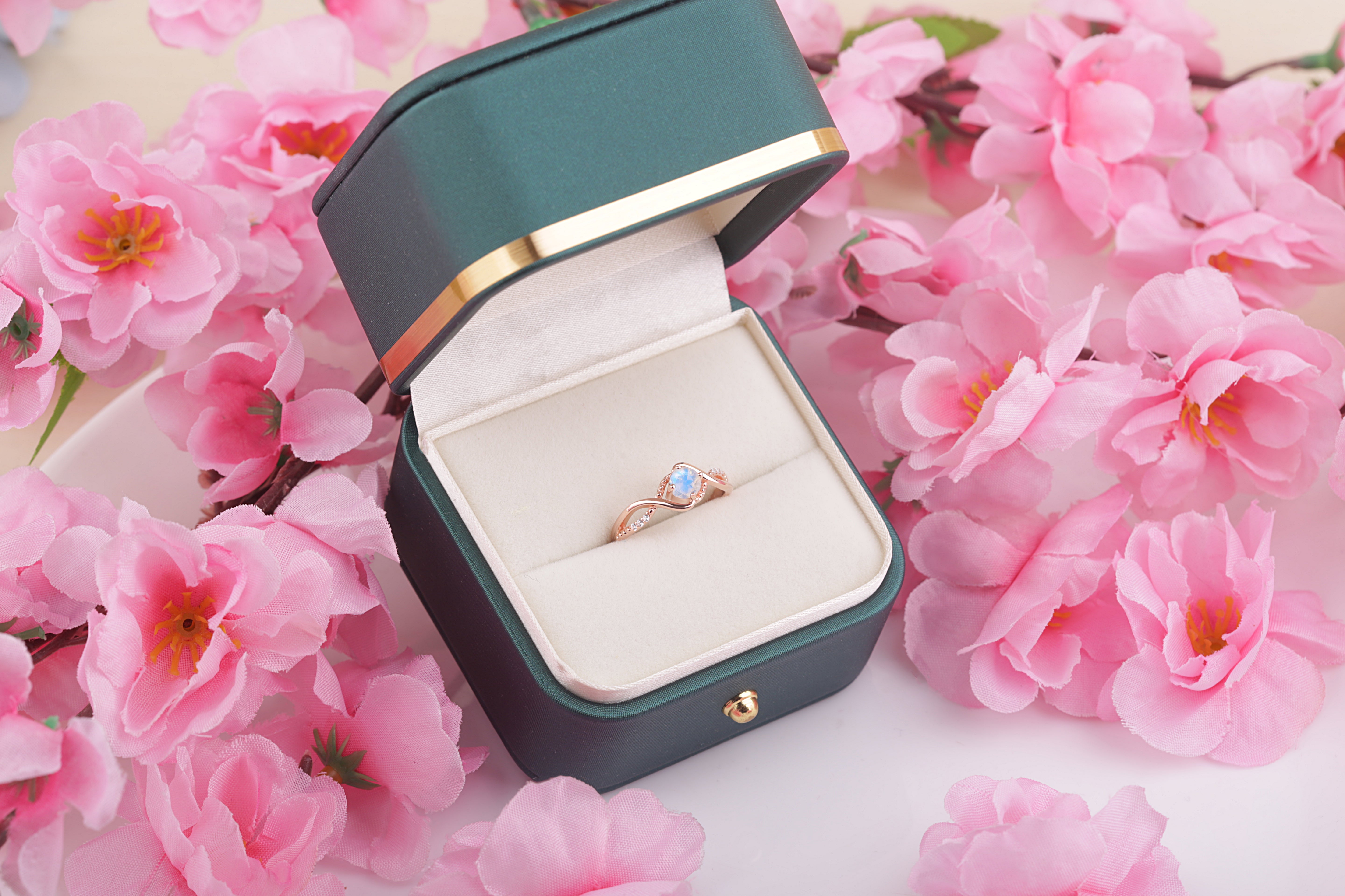 Vintage Moonstone ring in rose gold elegantly presented in a luxury box, perfect for special occasions.