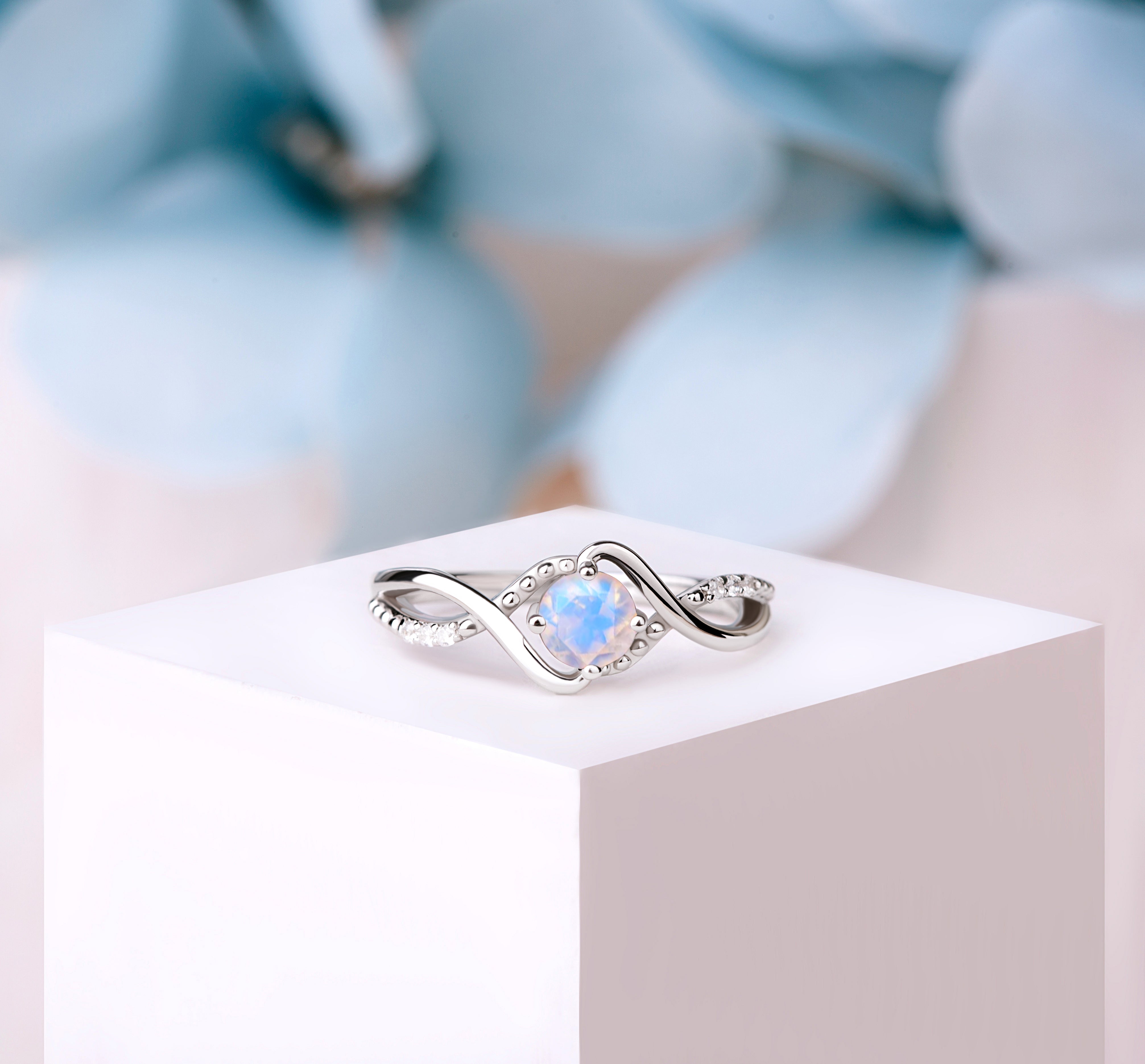 Silver vintage Moonstone ring with a 6mm oval-cut gemstone, showcasing its ethereal glow and detailed craftsmanship.