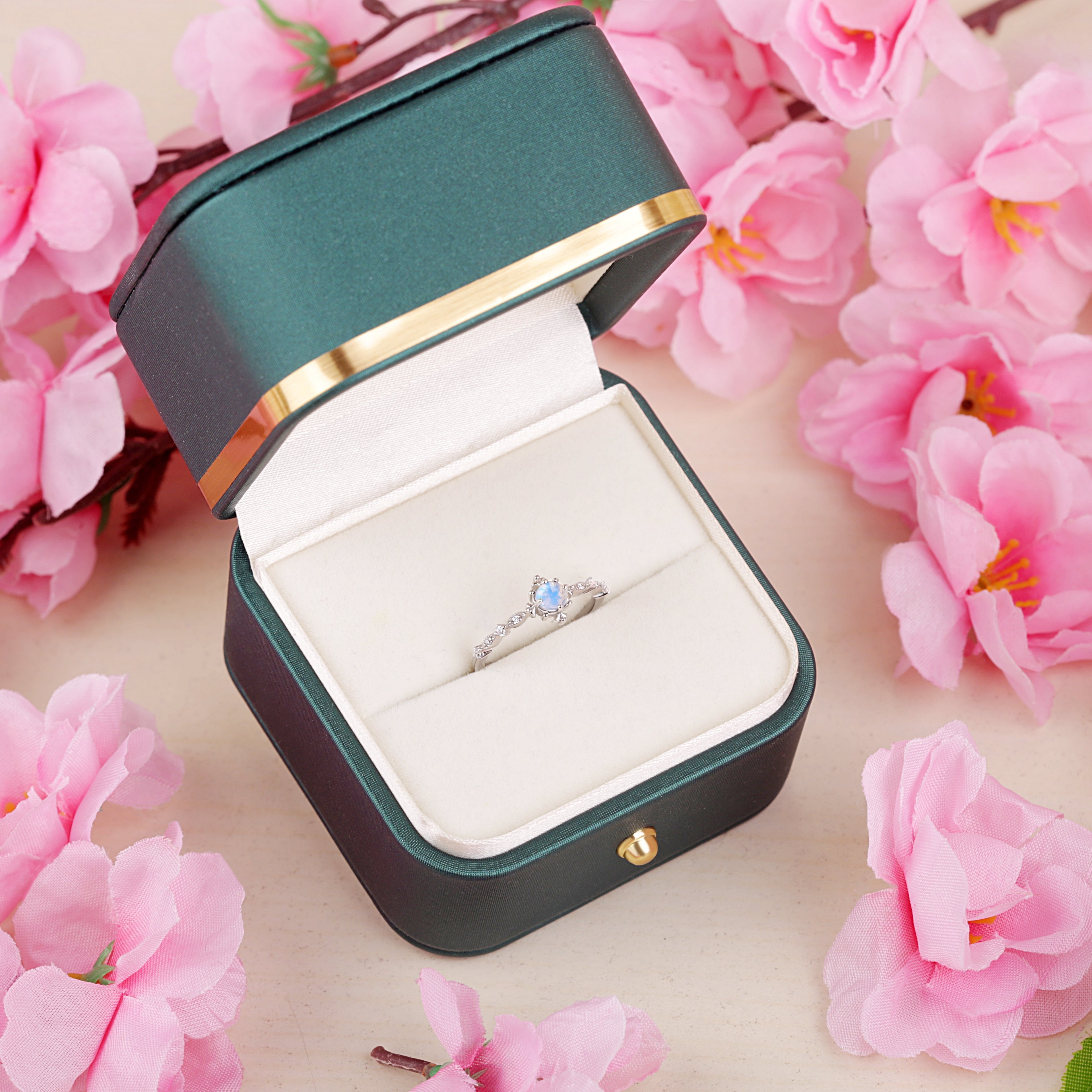 Vintage Opal Whispers ring in silver gold, beautifully presented in an elegant gift box.