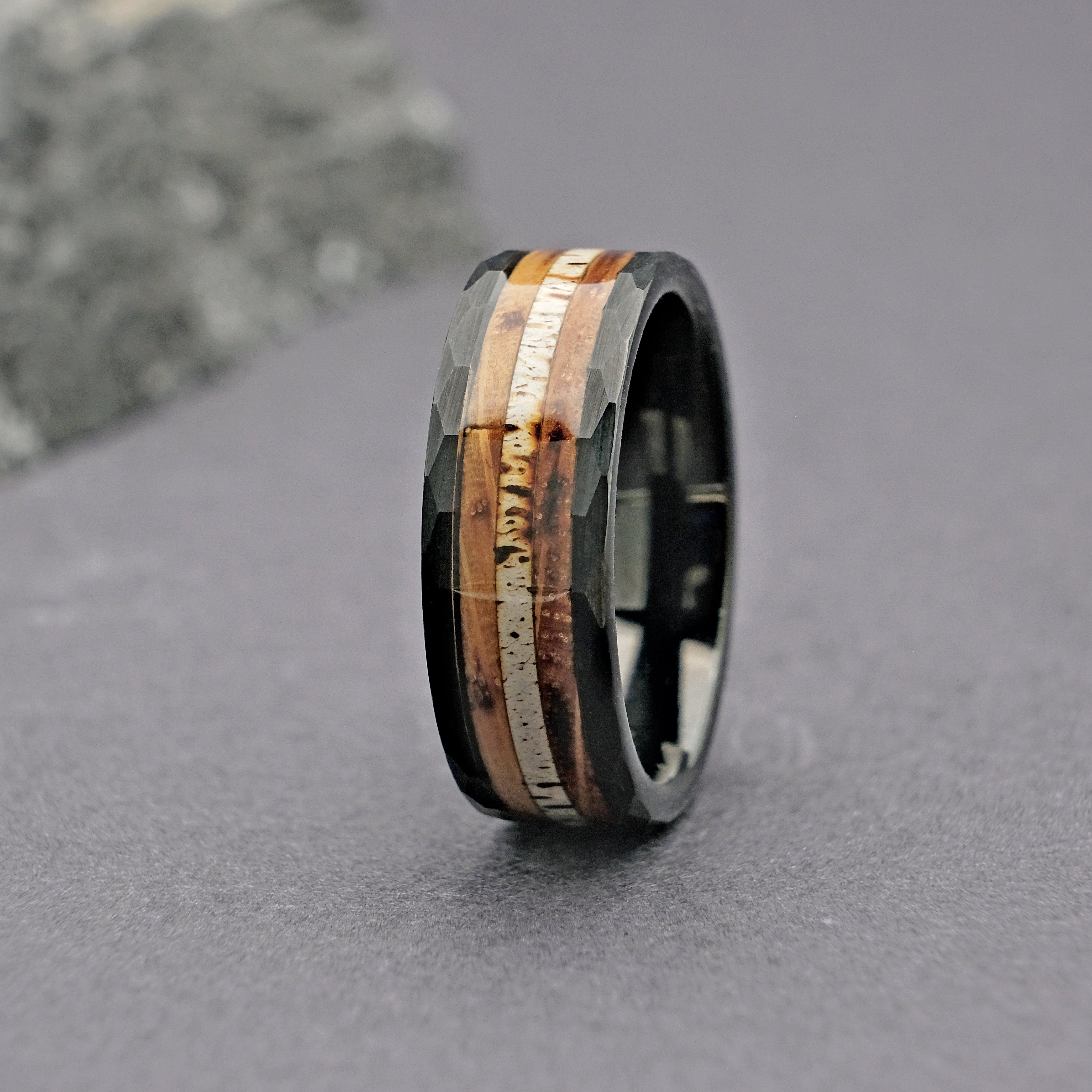 Close-up of the Whiskey Barrel Wedding Ring, showcasing the authentic whiskey barrel wood inlay and durable tungsten carbide band.